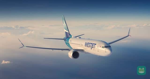 A WestJet Boeing 737 MAX 8 in flight. WestJet Rewards tier thresholds rise for status earned in 2027.