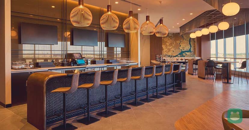 Bar and servery in Philadelphia’s A-West Admirals Club; representative lounge photo