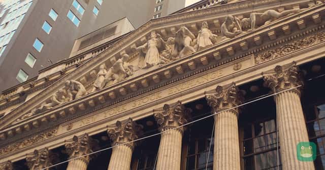 The columns and carved pediment of the New York Stock Exchange's Broad Street facade in New York City.